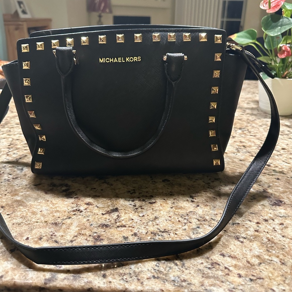 Studied black purse.
